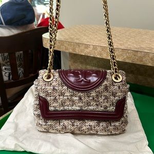 Tory Burch magnetic close bag with dust bag.